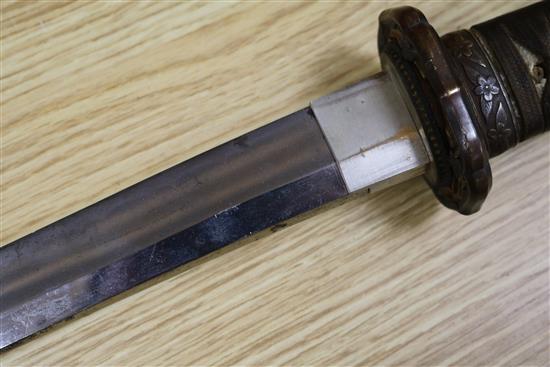 A WW2 Japanese katana with standard mounts, the blade with wavy hamon 98cm